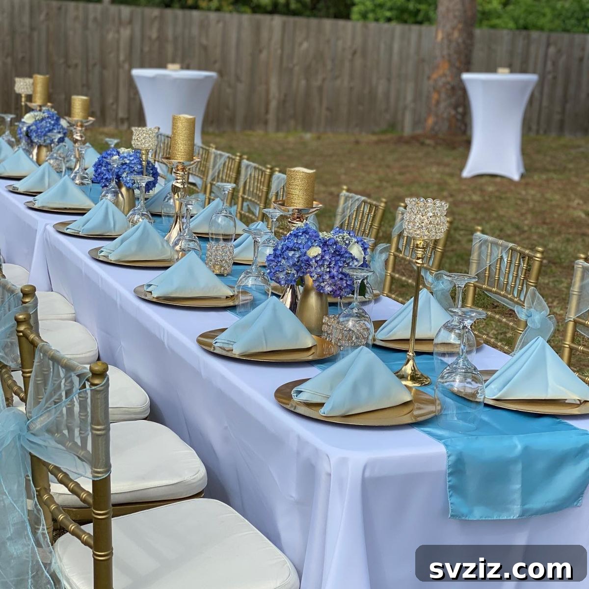 23 Dreamy Backyard Micro Wedding Concepts 24 Elegant baby blue and gold wedding table decor