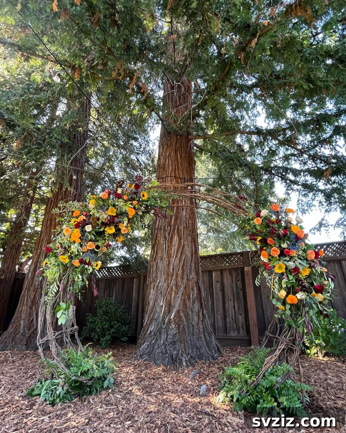 Warm Fall Backyard Wedding Inspirations 9 7. Floral Fall Arch