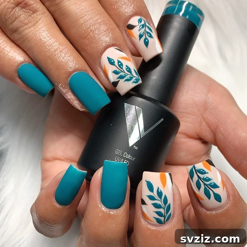Unique Blue and Yellow Fall Leaf Nail Design