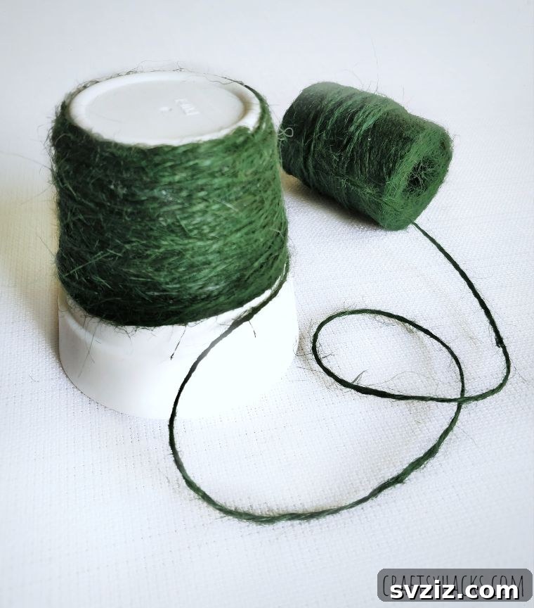 Continuous wrapping of green twine on flower pot