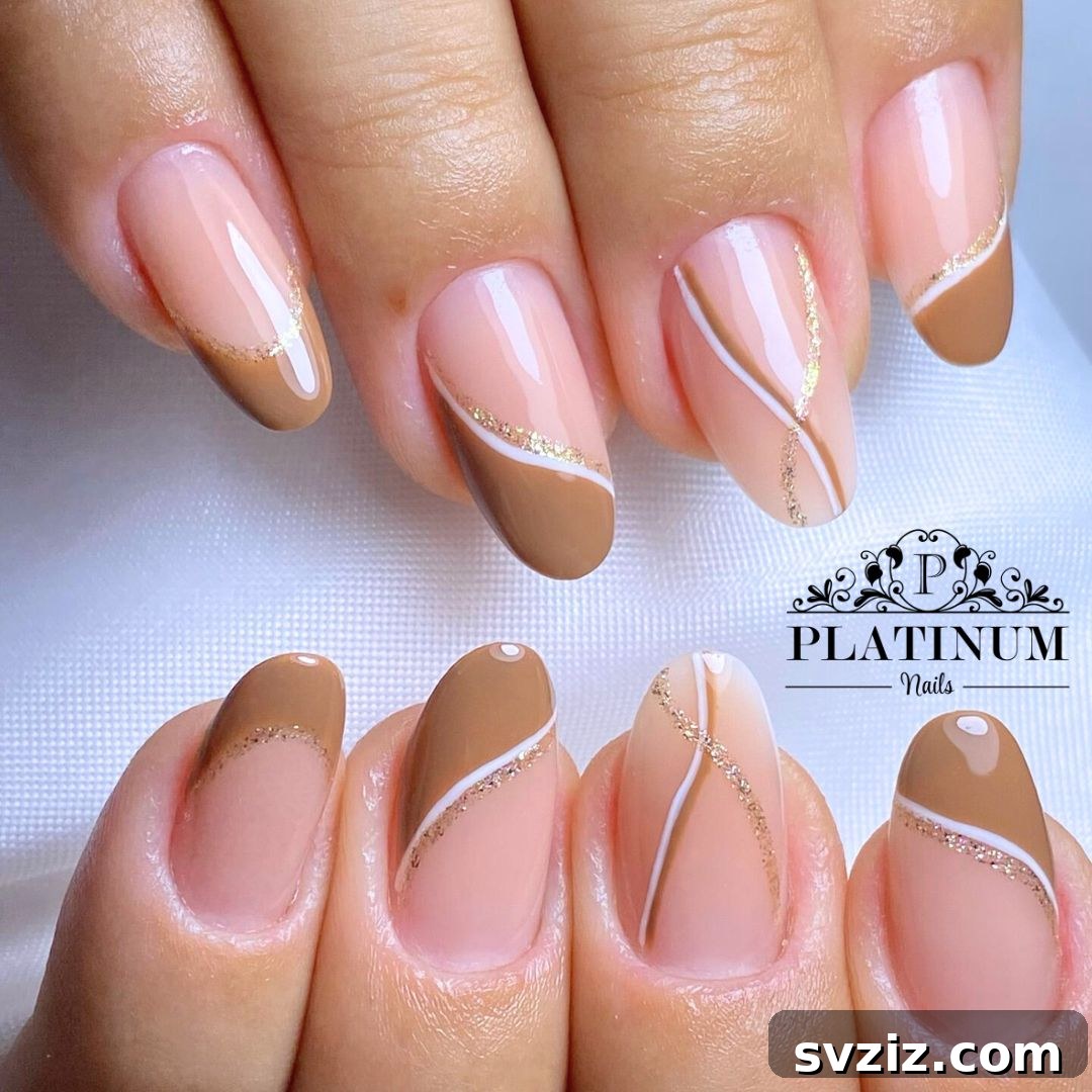 23 Hottest Autumn Nail Trends to Inspire You 18 Shimmery Chic Brown Swirl Nail Design