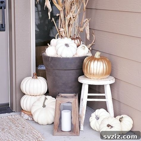 31 Autumn Outdoor Decor Ideas to Enhance Your Home's Curb Appeal 14 Elegant fall porch decor with understated colors and chic vibes