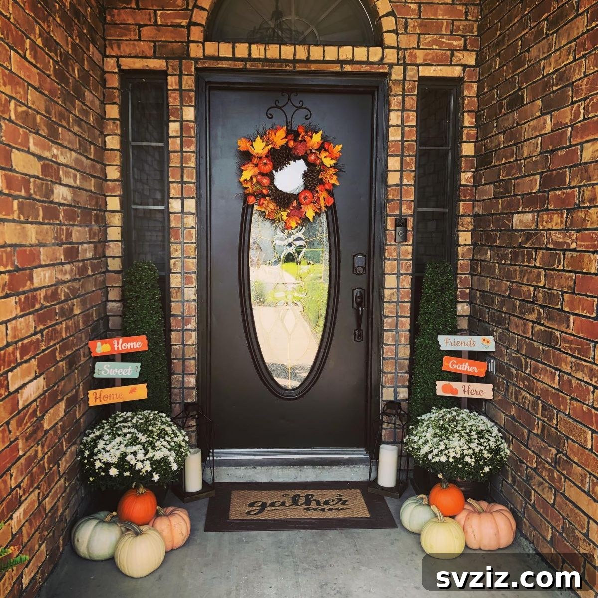 31 Autumn Outdoor Decor Ideas to Enhance Your Home's Curb Appeal 4 Fall Porch with traditional orange and yellow florals and a wreath