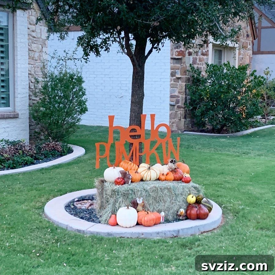 31 Autumn Outdoor Decor Ideas to Enhance Your Home's Curb Appeal 32 Charming 'Hello Pumpkin' hay bale decor with authentic rustic look
