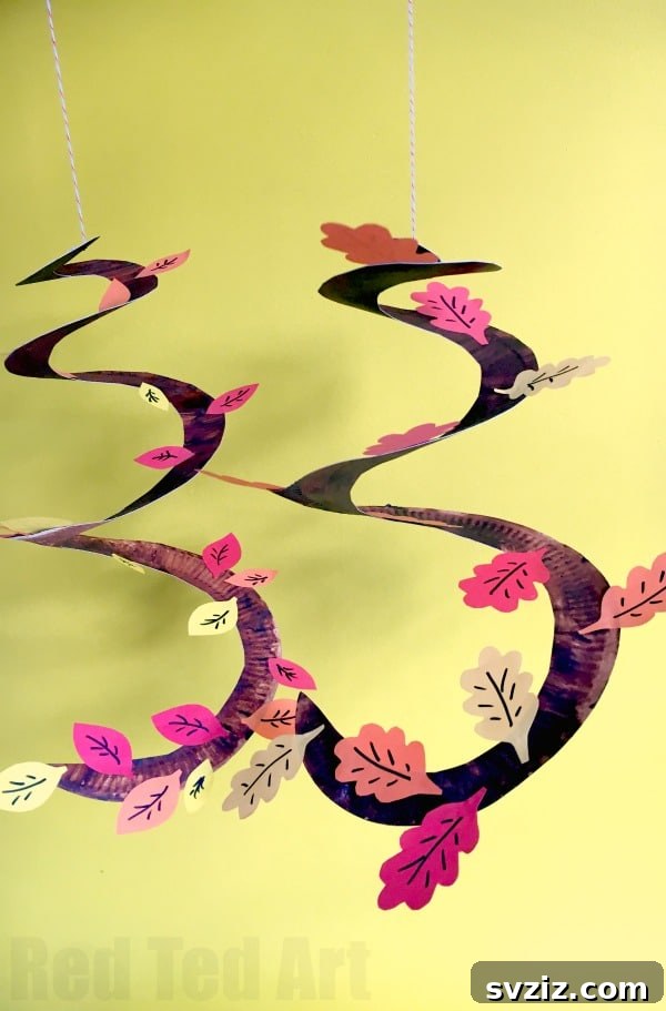 27 Delightful Autumn Crafts for Little Ones 14 Dynamic Autumn Tree Paper Plate Whirligig craft for kids