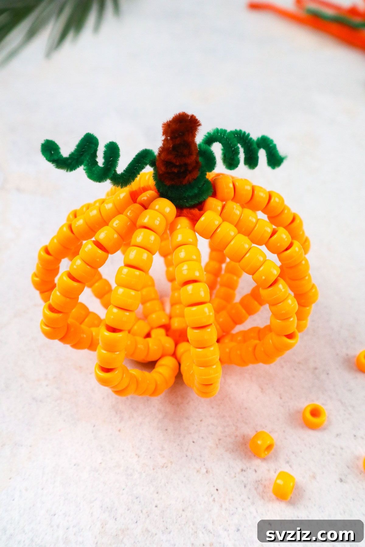 27 Delightful Autumn Crafts for Little Ones 3 Easy DIY Pipe Cleaner Pumpkin craft for toddlers