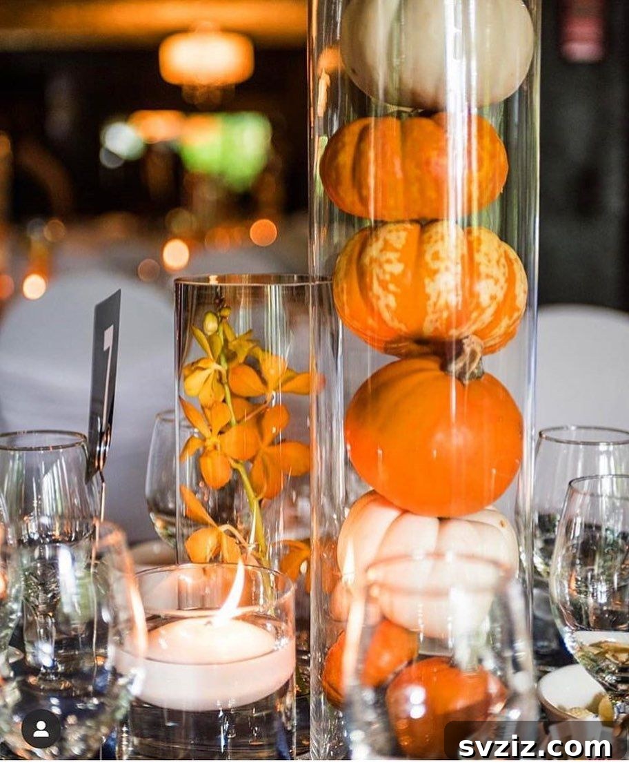21 Elegant Fall Rustic Wedding Tabletop Concepts 3 Rustic Fall Wedding Centerpiece with Mini Pumpkins and Flowers in Clear Vases