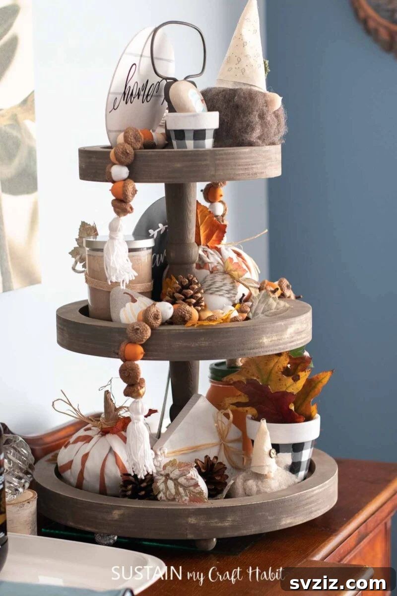 31 Chic Fall DIY Projects for Adult Homes 23 Stylish DIY tiered tray decorated with fall farmhouse accents, perfect for seasonal displays.