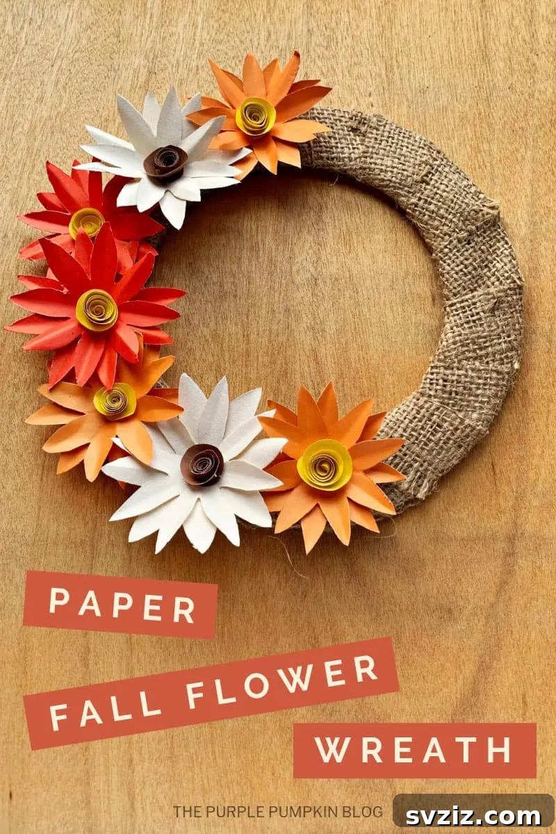 31 Chic Fall DIY Projects for Adult Homes 30 Colorful DIY paper flower wreath crafted with autumnal colors, a festive decoration for fall.