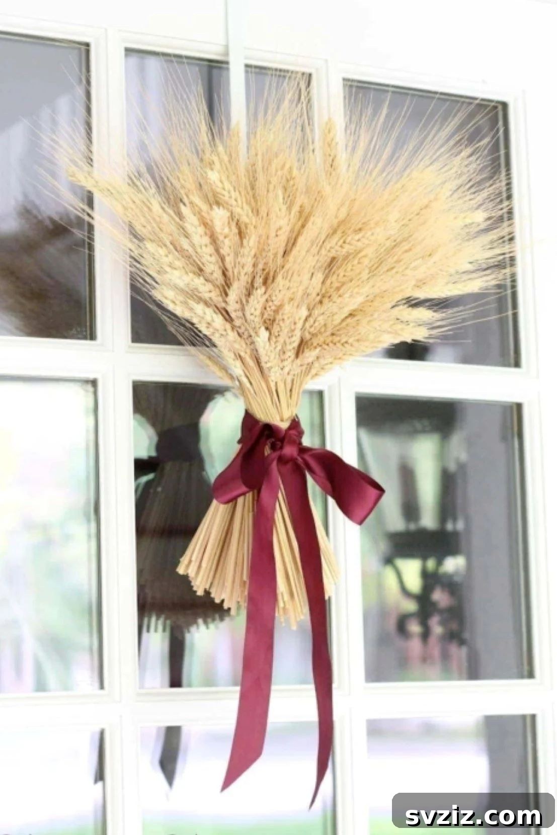 31 Chic Fall DIY Projects for Adult Homes 32 Graceful DIY wheat sheaf for door decor, a simple yet elegant fall accent.