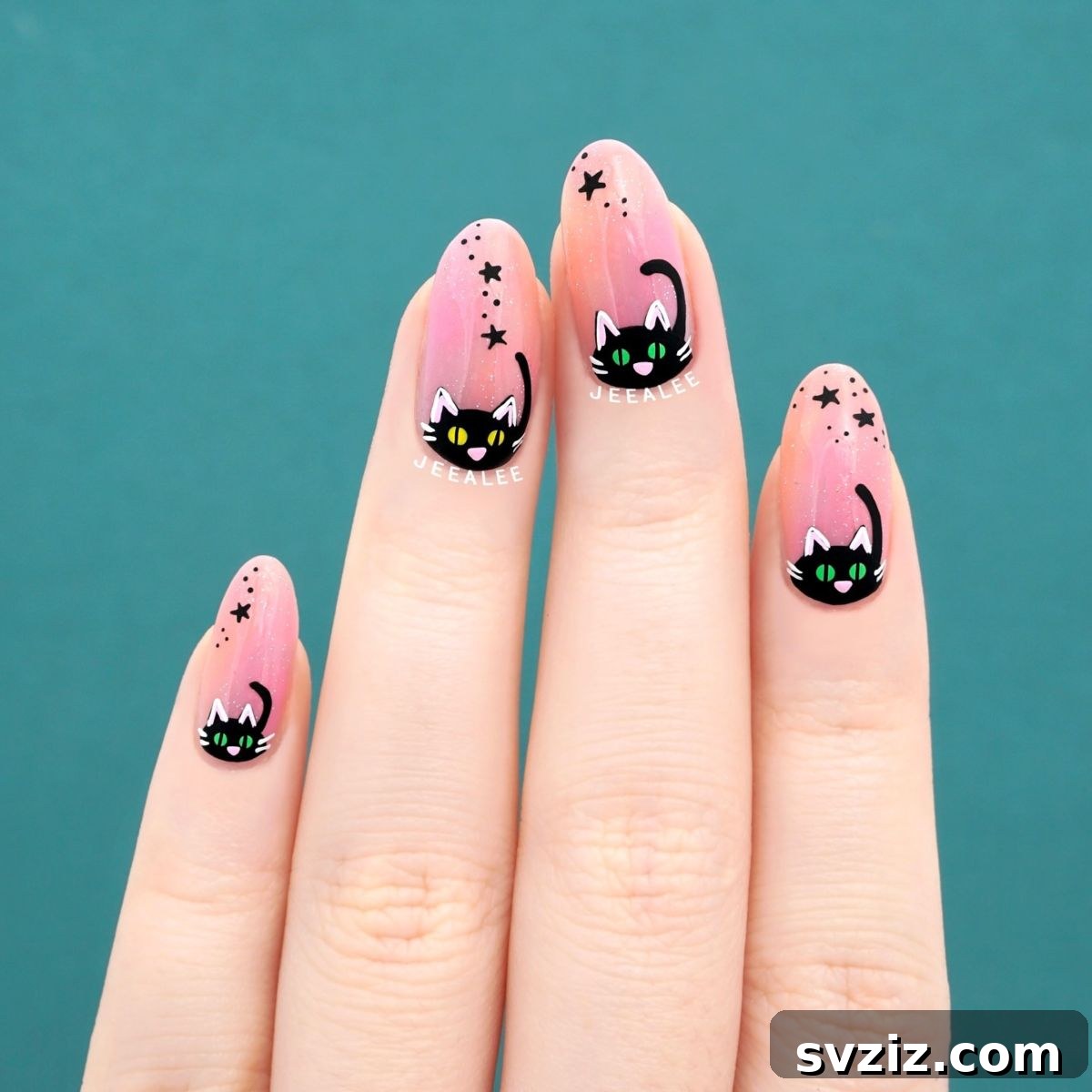 9. Dainty Black Kitty Kat Nails