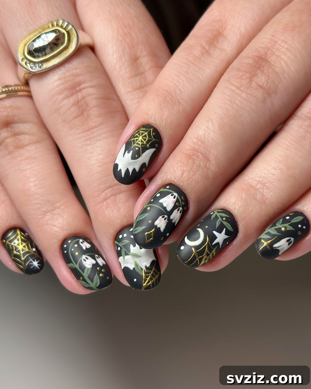21. Black, White, and Gold with Subtle Leaves