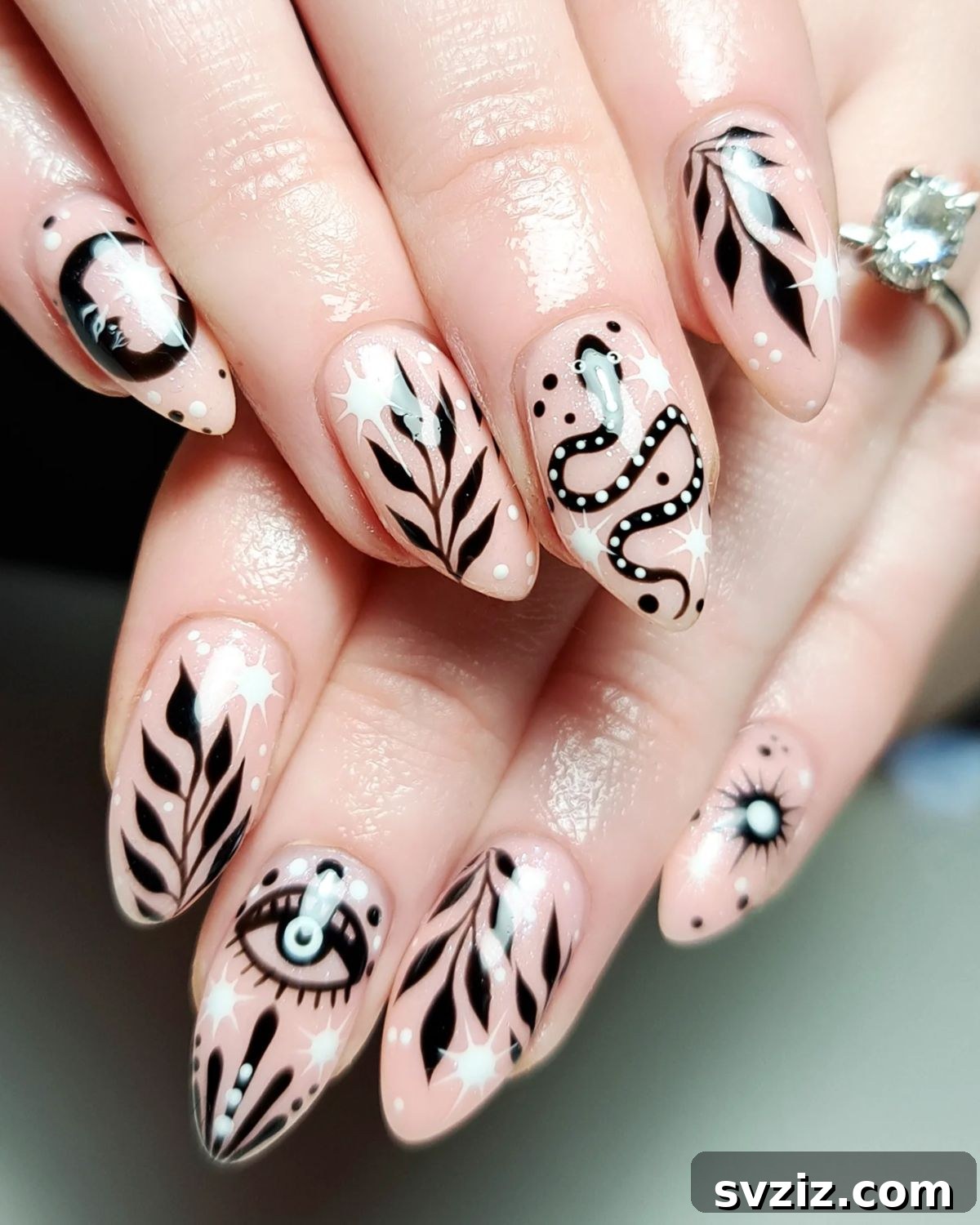 3. Black and White Witchy Nails