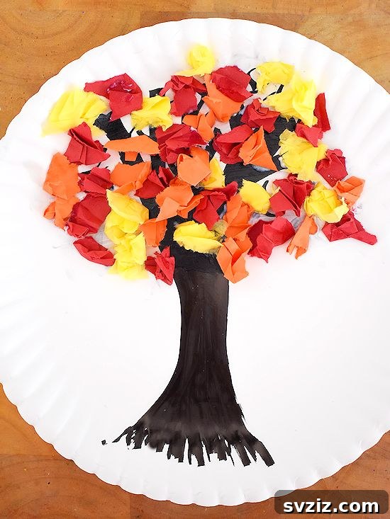 23 Gobble-Worthy Thanksgiving Art Ideas for Little Hands 11 9. Tissue Paper Fall Tree Craft