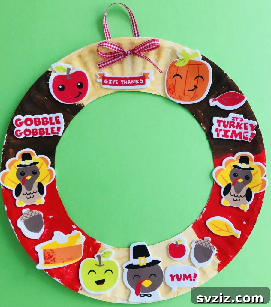 23 Gobble-Worthy Thanksgiving Art Ideas for Little Hands 8 6. Thanksgiving Paper Plate Wreath Craft