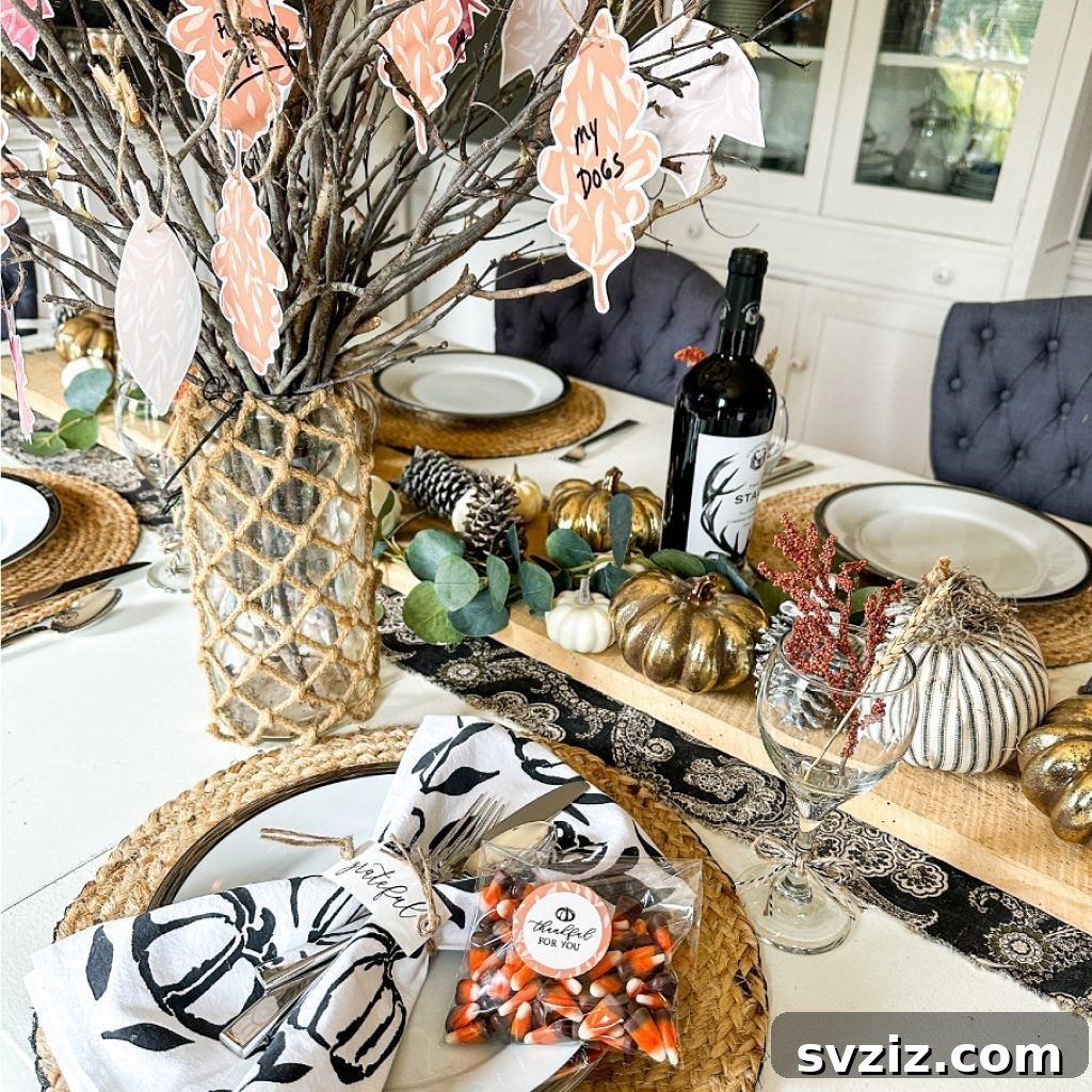 Craft the Perfect Feast: 21 DIY Thanksgiving Tablescapes 23 A Thanksgiving tablescape blending charming and sophisticated elements, featuring artificial pumpkins, 'grateful' napkin rings, and adorable candy corn bags.