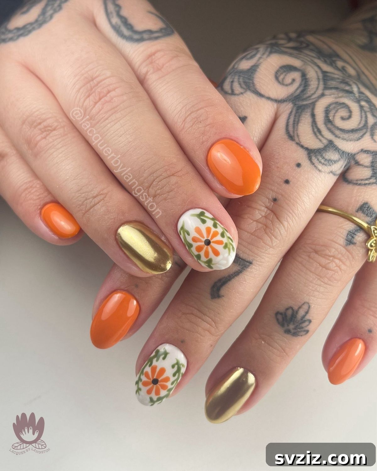 Gleaming Chrome Nail Art for Autumn 21 19. Gold Chrome and Florals