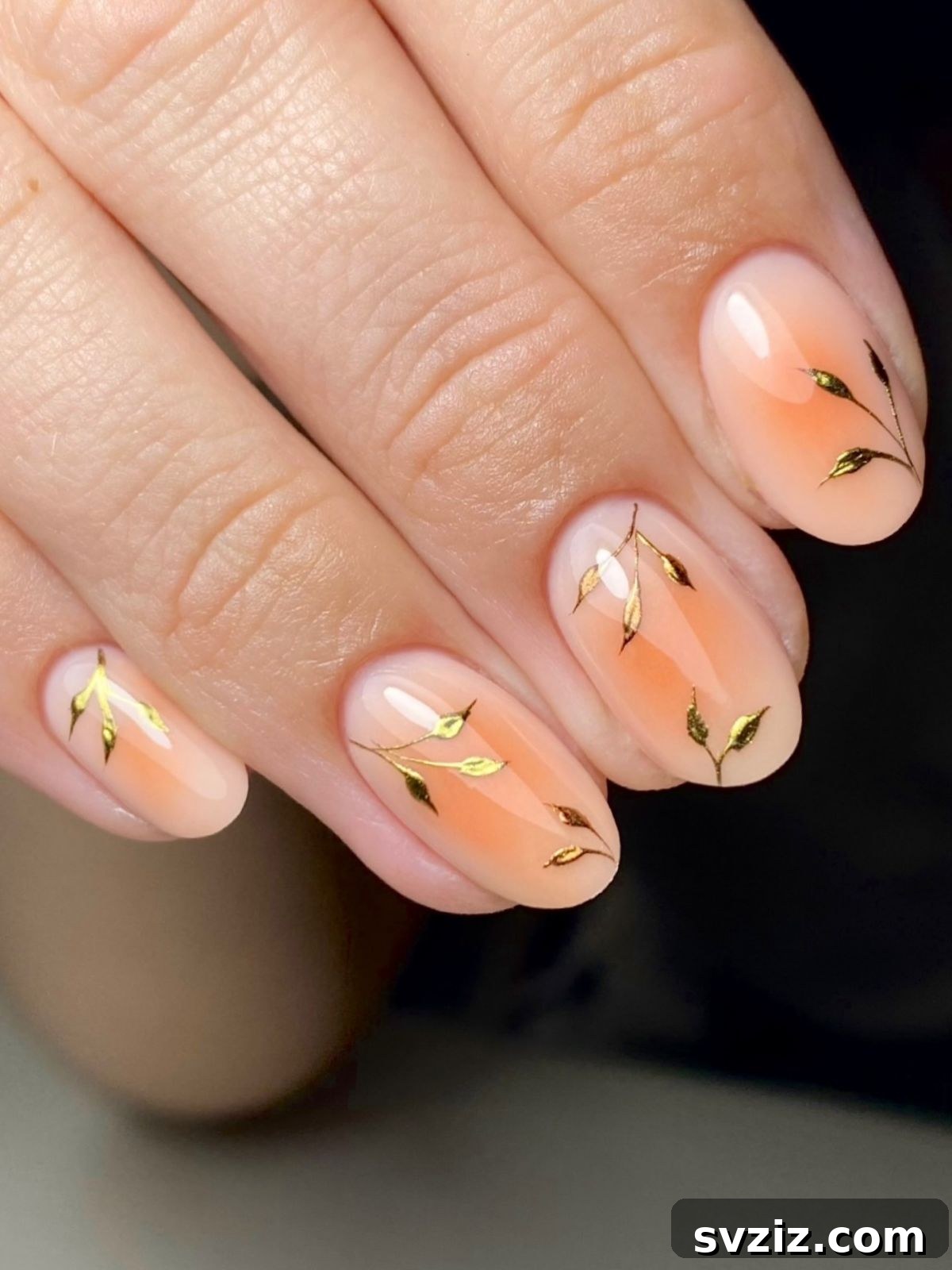 Gleaming Chrome Nail Art for Autumn 22 20. Aura Nails with Chrome Gold Leaves