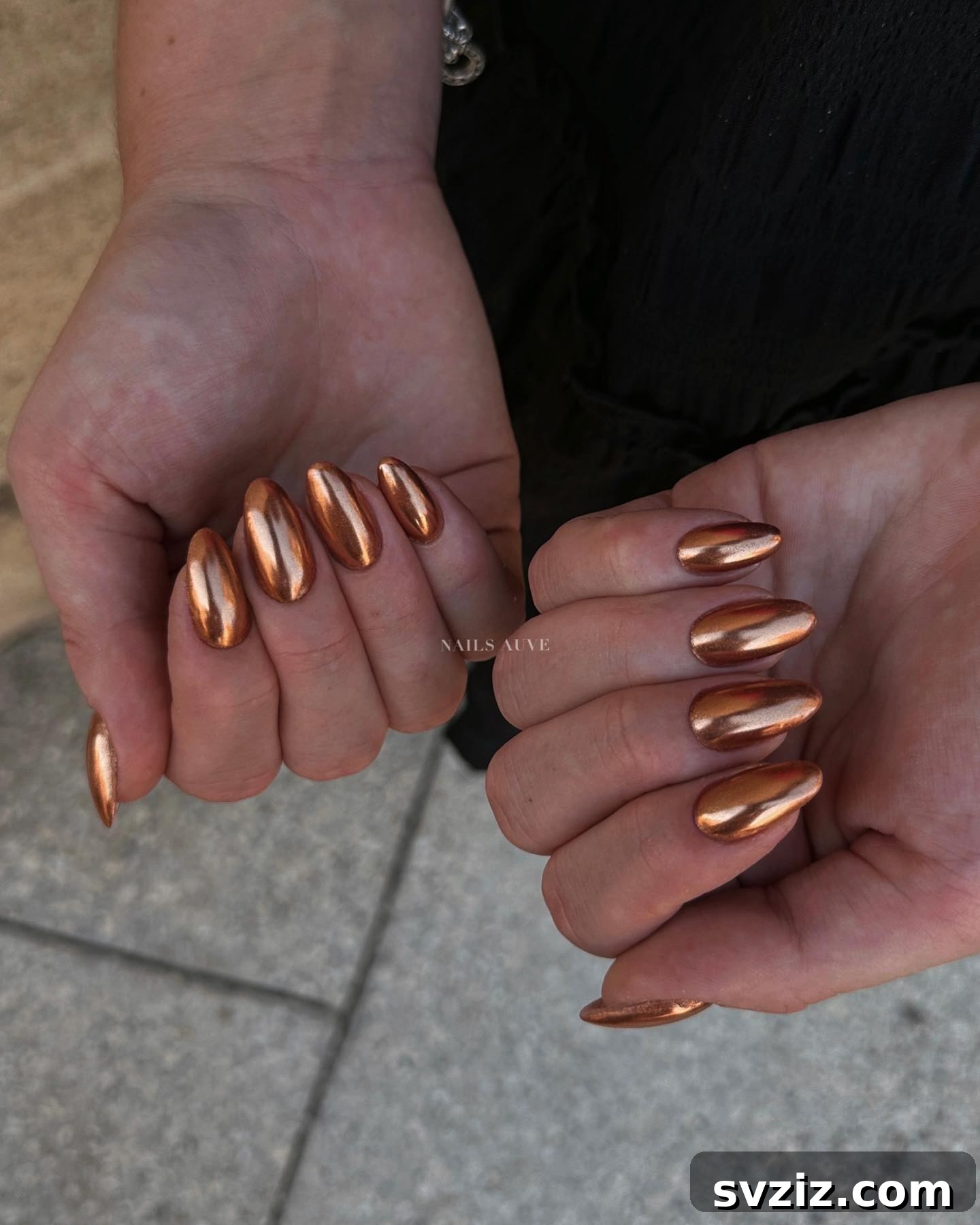 Chic Autumn Almond Nail Ideas 14 Radiant copper chrome almond nails, offering festive shine and sophisticated elegance for the fall season