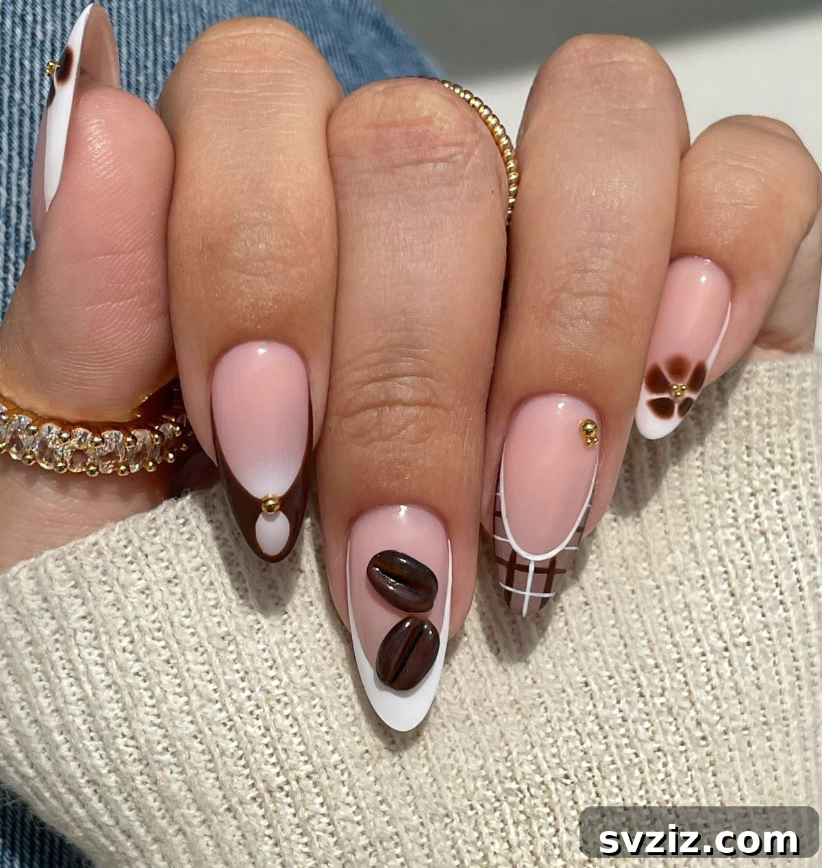 Chic Autumn Almond Nail Ideas 19 Perfect brown almond nails with stunning designs including a playful checkered tip, gold rhinestone, and elegant brown flower