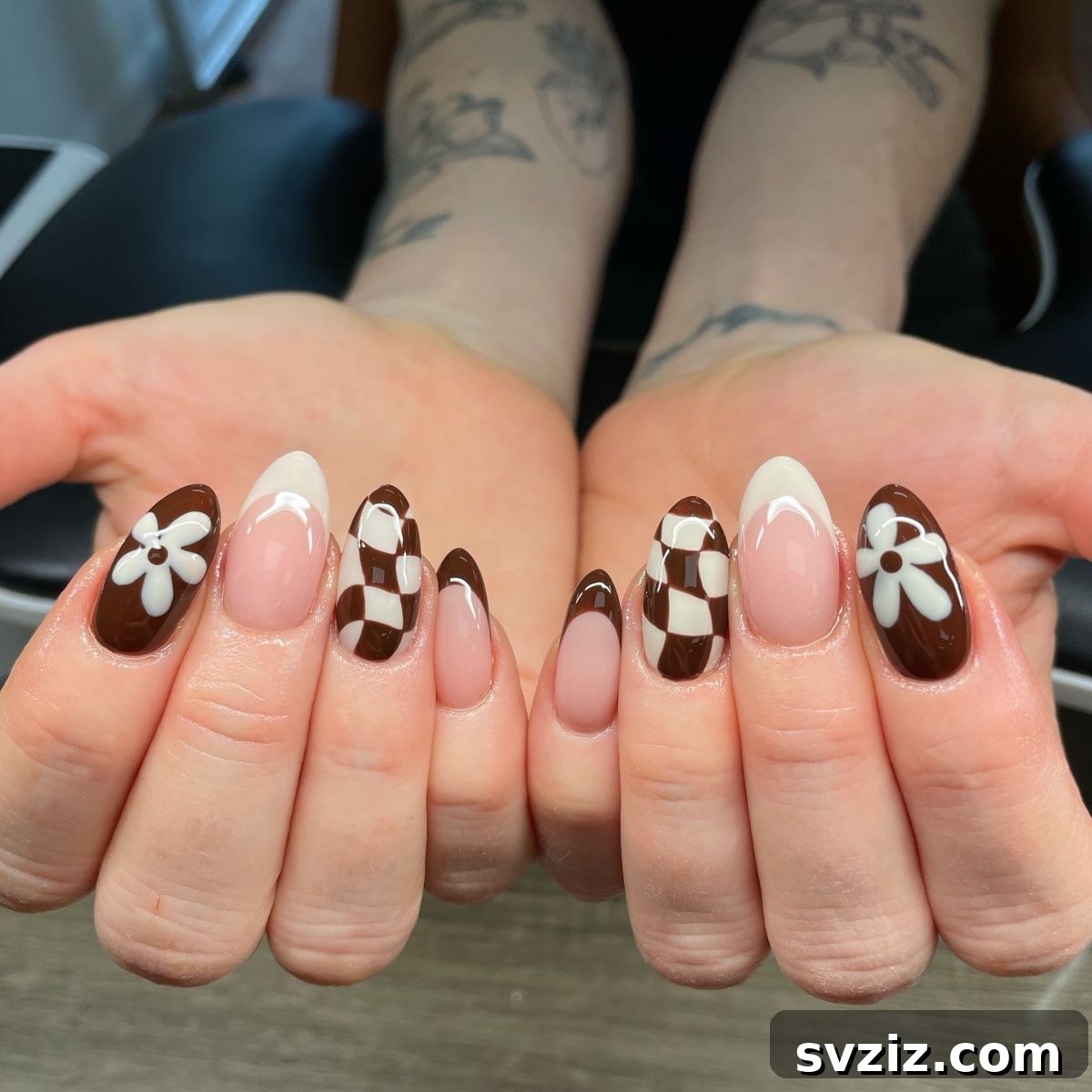 Chic Autumn Almond Nail Ideas 20 Fun, bright, and whimsical brown and white fall manicure featuring charming checkered and delicate floral accents