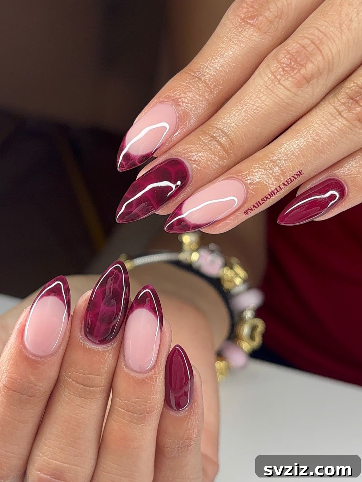 Chic Autumn Almond Nail Ideas 6 Elegant pink and red tortoise almond nails featuring intricate patterns for a chic fall look