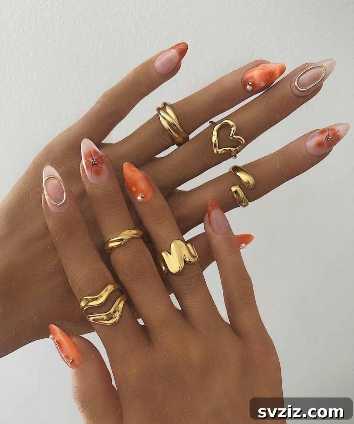 Get Festive Fingers: 21 Adorable Thanksgiving Nail Ideas 15 Glitzy Orange Thanksgiving Manicure with Rhinestones