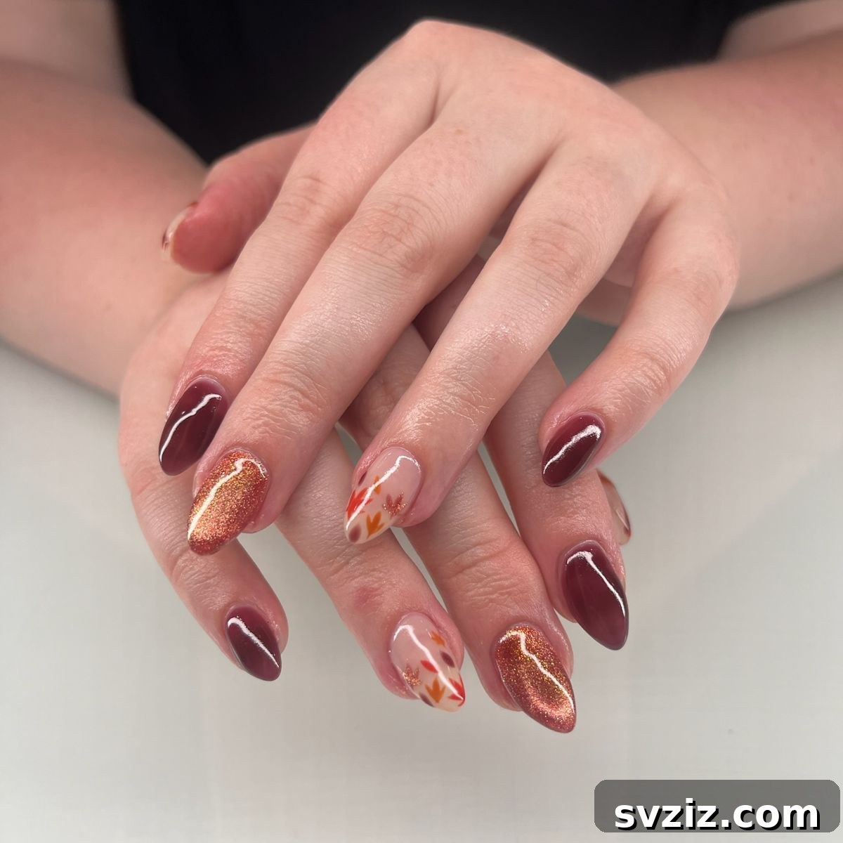 Get Festive Fingers: 21 Adorable Thanksgiving Nail Ideas 21 Glitter and Leaves Thanksgiving Nail Design