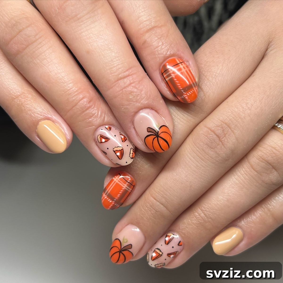 Get Festive Fingers: 21 Adorable Thanksgiving Nail Ideas 6 Orange Plaid and Pumpkin Pie Thanksgiving Nail Art