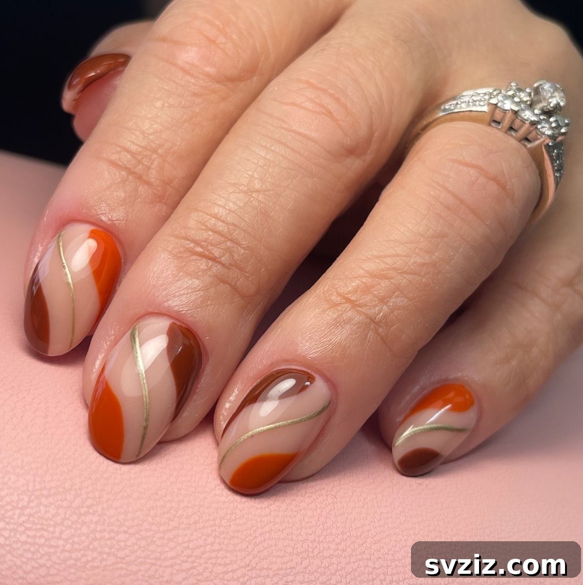 Get Festive Fingers: 21 Adorable Thanksgiving Nail Ideas 10 Understated Swirly Fall Nail Art for Thanksgiving