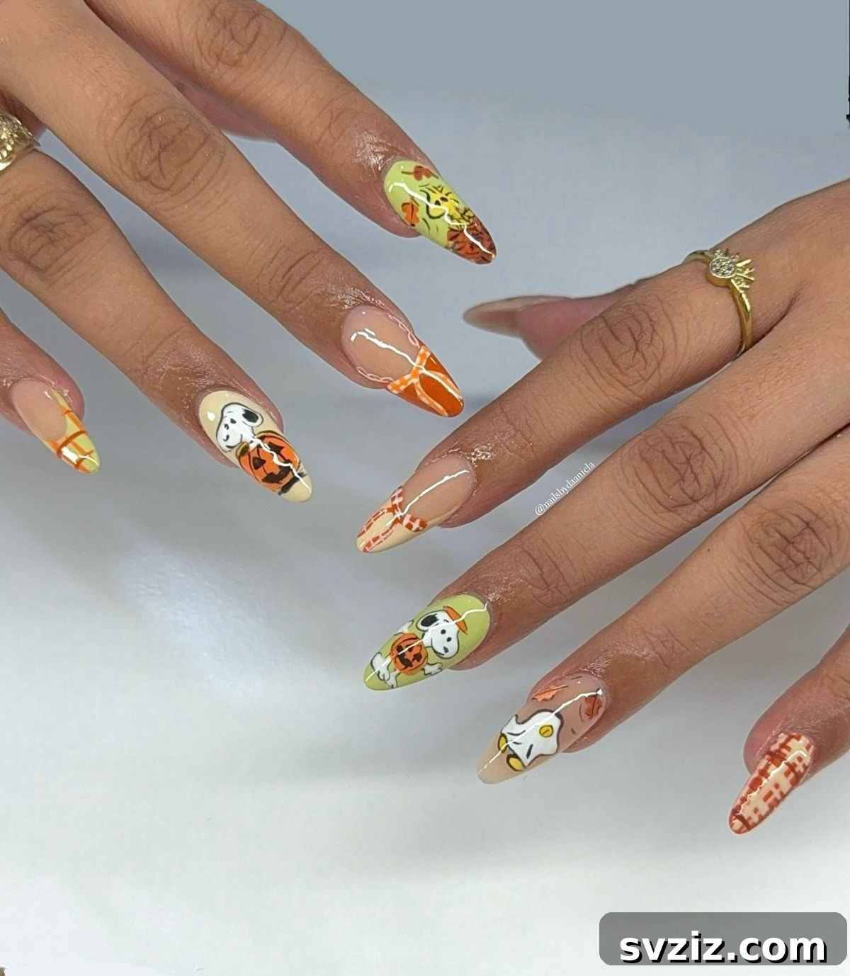 21 Exquisite Almond Nail Designs for Thanksgiving 23 21. Colorful, Whimsical, and Elegant Almond Nails for Thanksgiving