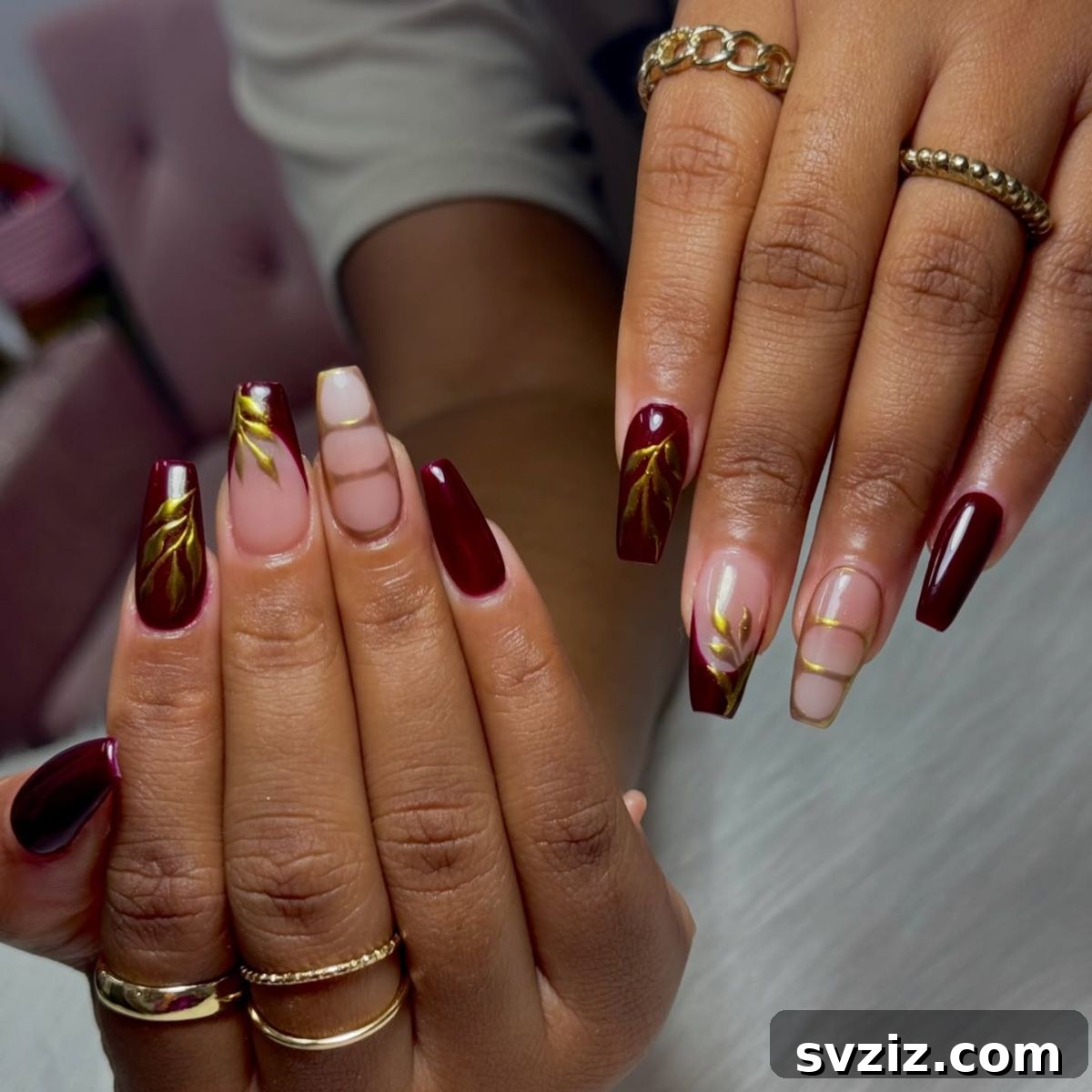 Stunning Thanksgiving Acrylic Nail Art for the Holiday Season 11 Sophisticated burgundy and gold coffin nails with intricate leafy designs, perfect for an elegant Thanksgiving manicure.