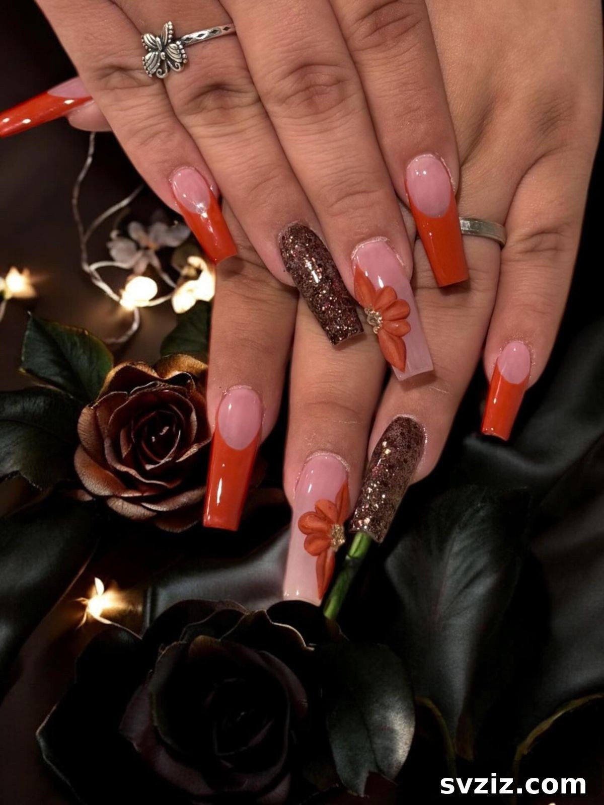 Stunning Thanksgiving Acrylic Nail Art for the Holiday Season 20 Sophisticated Thanksgiving acrylics in burnt orange with a sparkly brown accent and stunning 3D florals for a festive look.