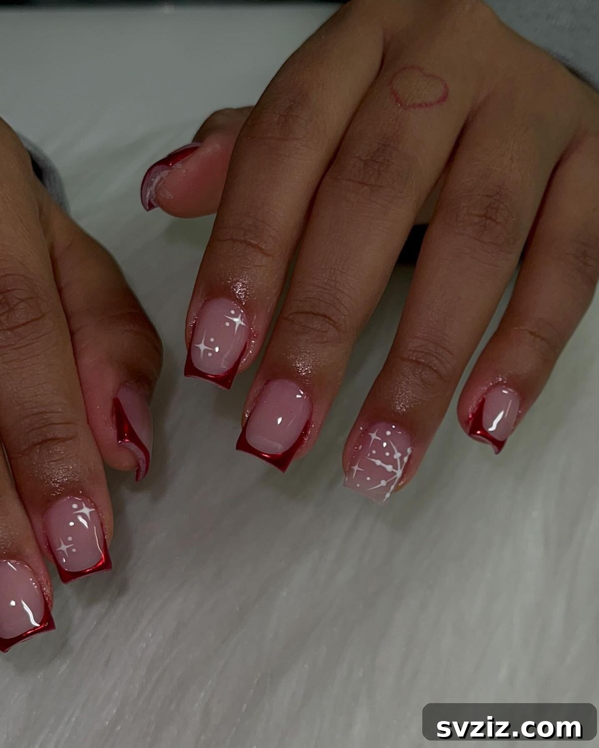 1. Nude Pink Polish with Red Tips