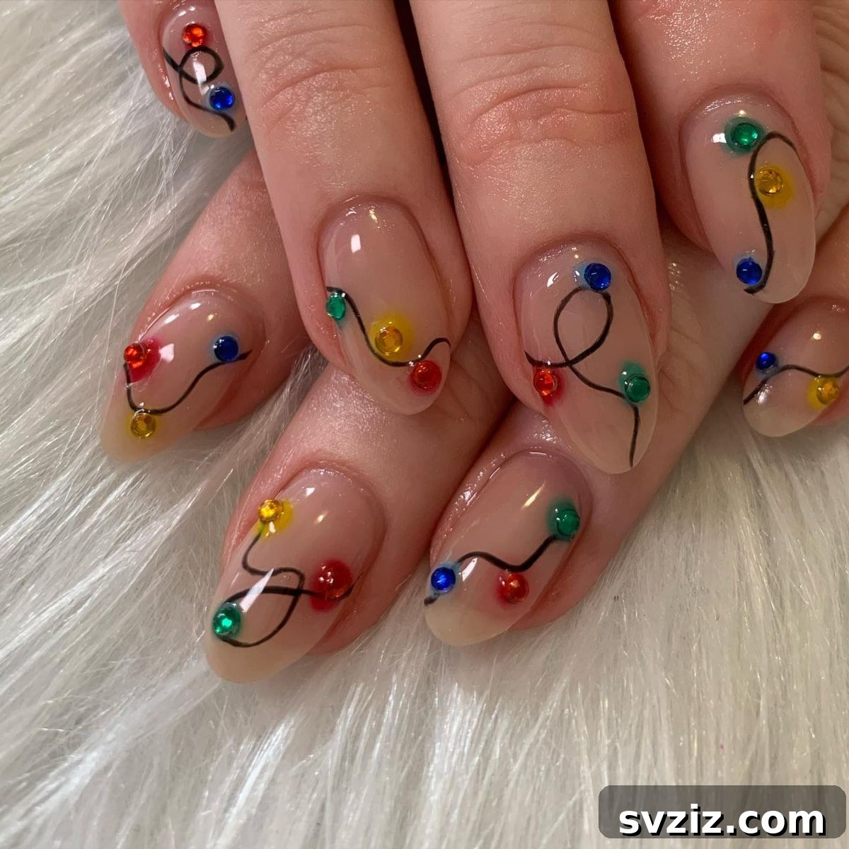 4. Christmas Light Nails with Gems