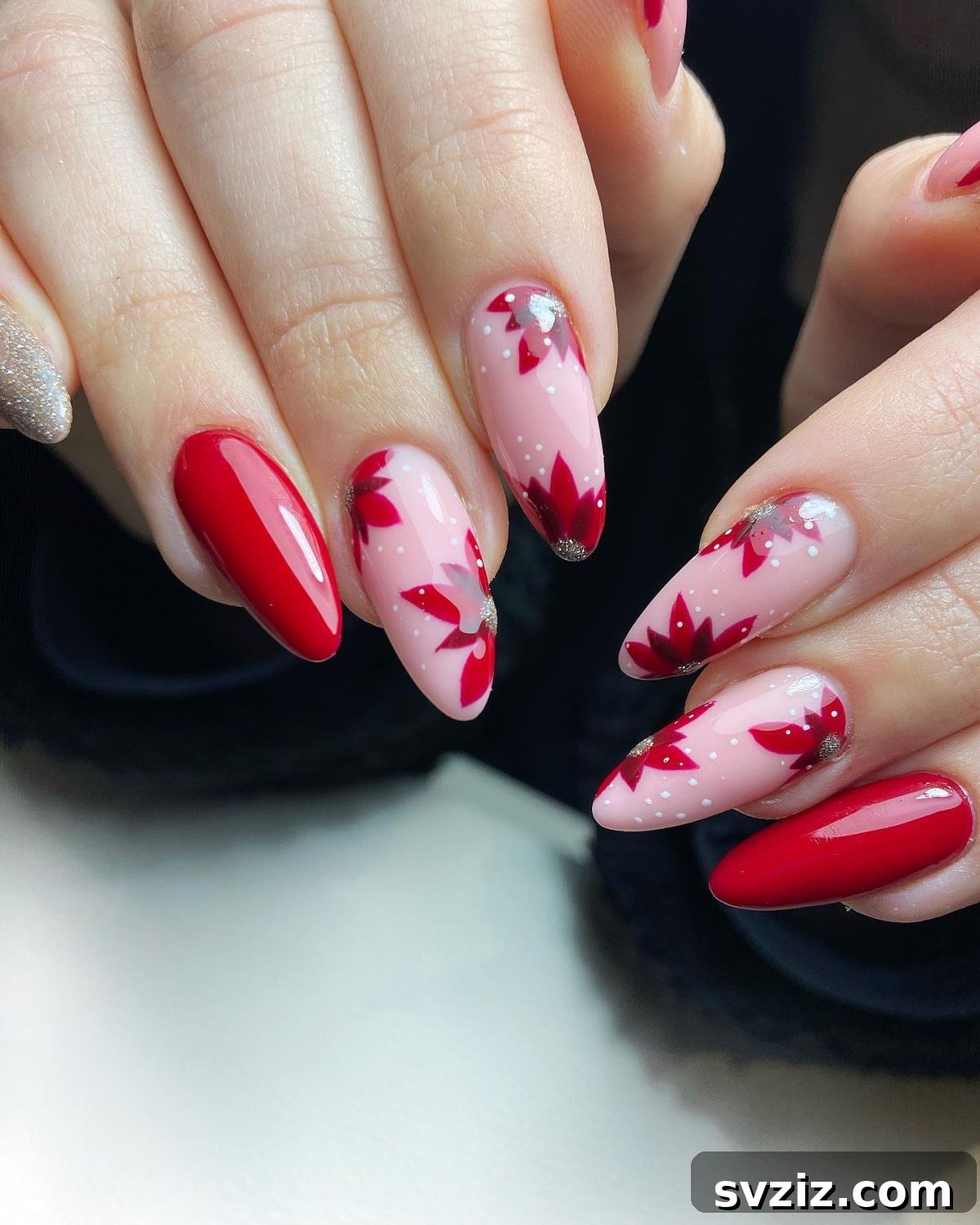 Festive Red Christmas Nail Art Ideas to Inspire Your Holiday Look 12 10. Poinsettia Nails