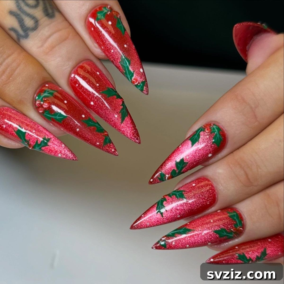 Festive Red Christmas Nail Art Ideas to Inspire Your Holiday Look 17 15. Red Cat Eye Nails