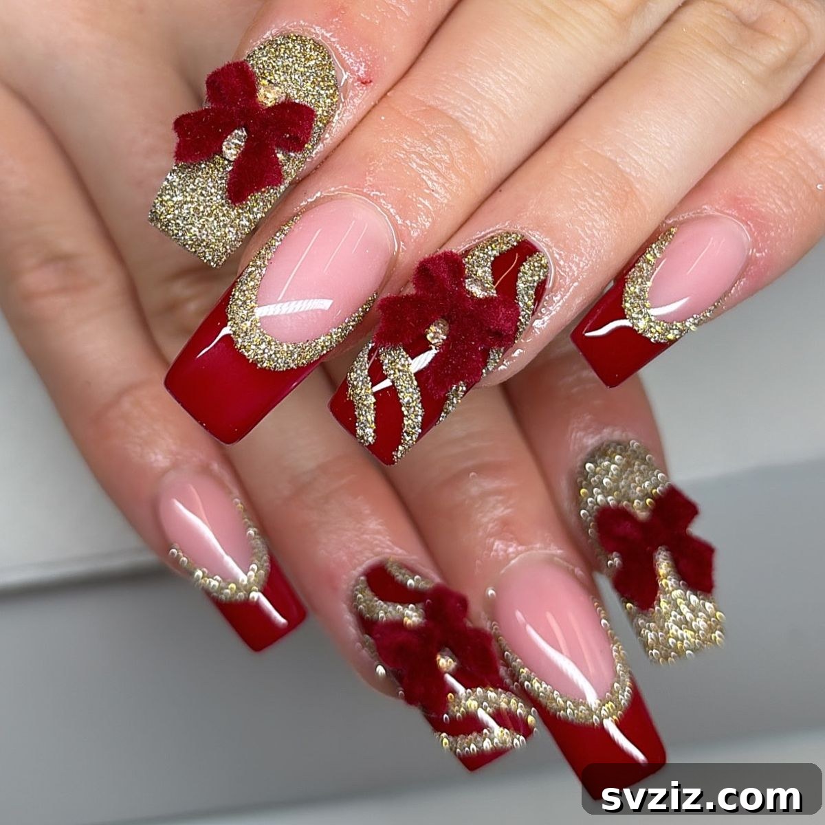 Festive Red Christmas Nail Art Ideas to Inspire Your Holiday Look 18 16. Glitzy Red and Gold with Beautiful Bows