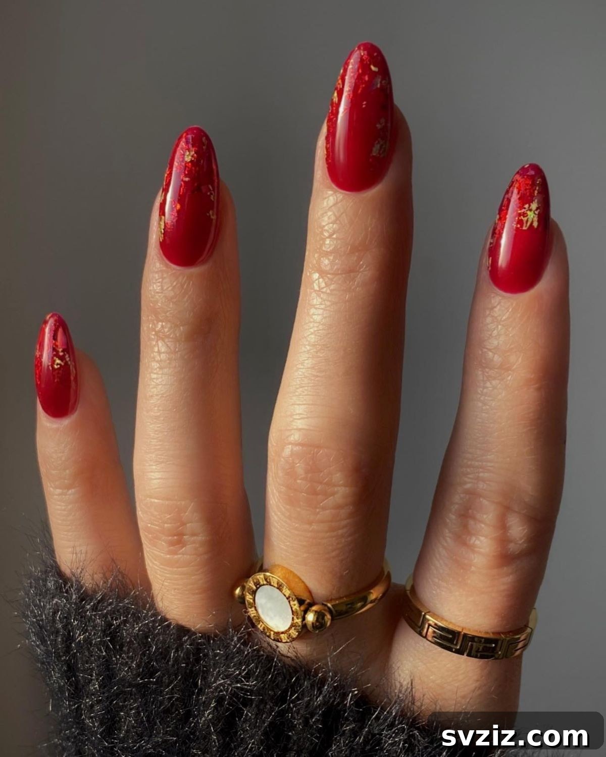 Festive Red Christmas Nail Art Ideas to Inspire Your Holiday Look 20 18. Holographic Foil Nails