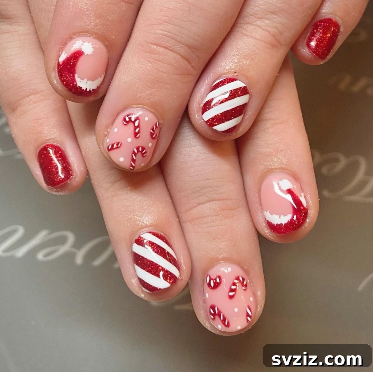 Festive Red Christmas Nail Art Ideas to Inspire Your Holiday Look 3 1. Santa and Candy Cane Nails