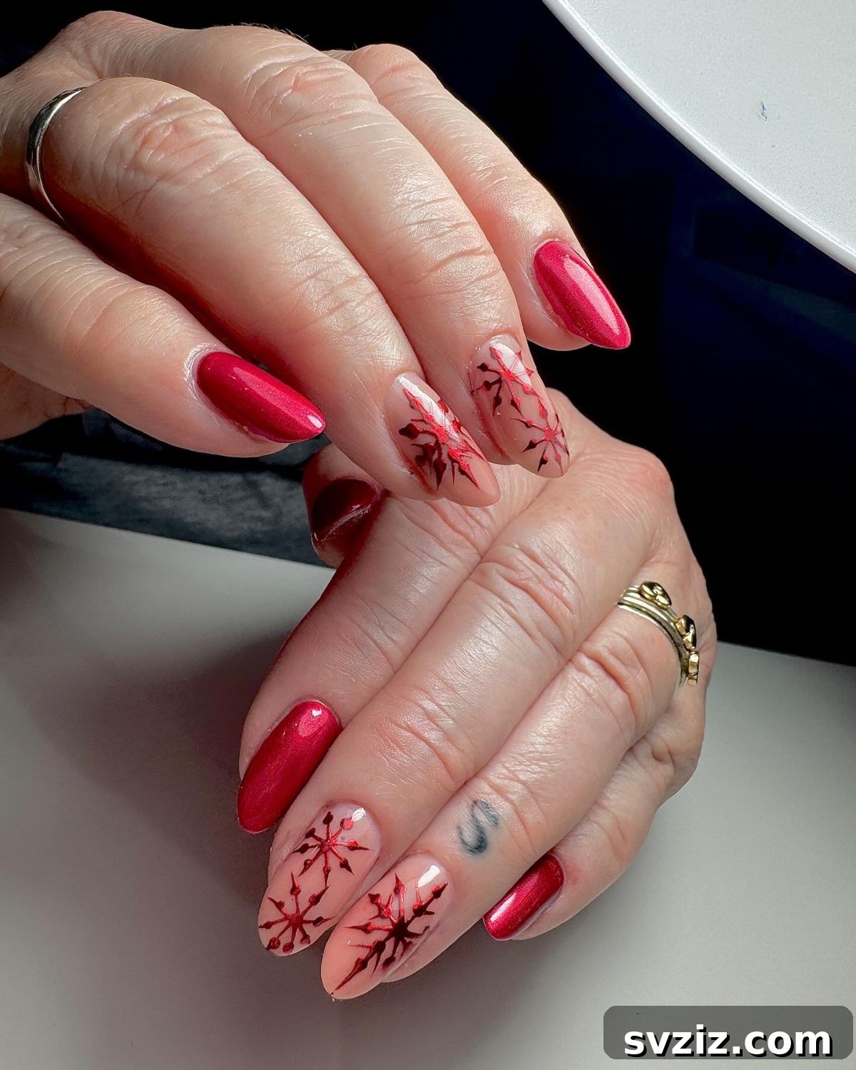 Festive Red Christmas Nail Art Ideas to Inspire Your Holiday Look 21 19. Red Snowflake Accents