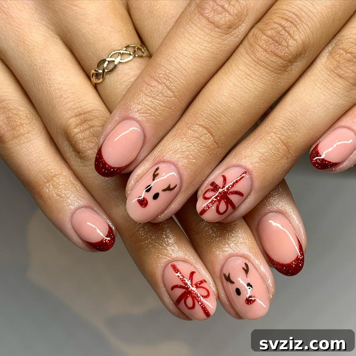 Festive Red Christmas Nail Art Ideas to Inspire Your Holiday Look 5 3. Bows and Reindeer