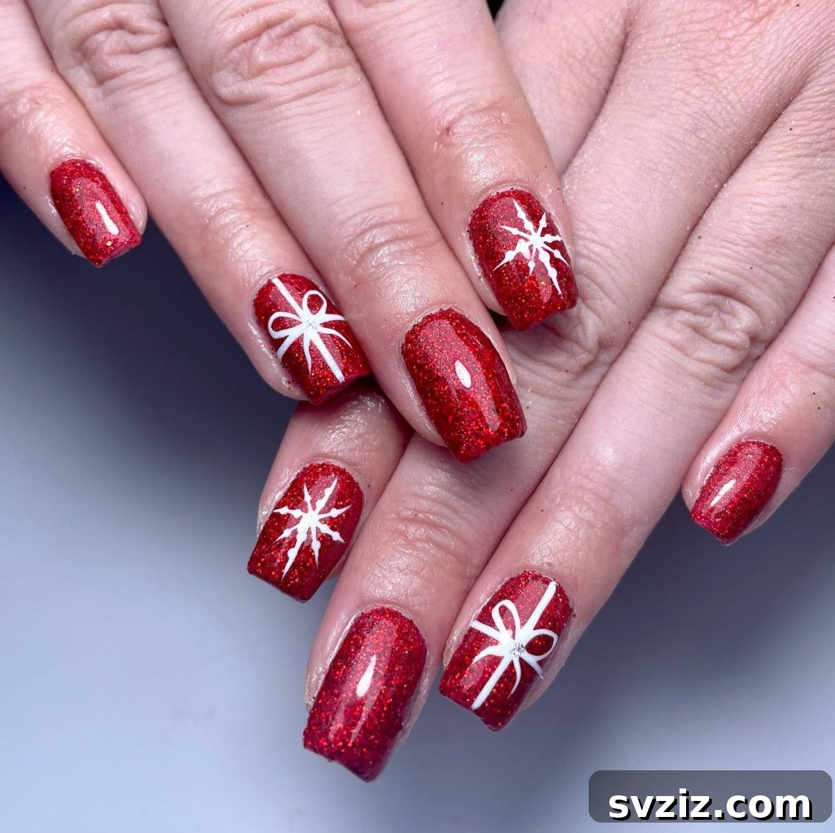 Festive Red Christmas Nail Art Ideas to Inspire Your Holiday Look 6 4. Sparkly Red