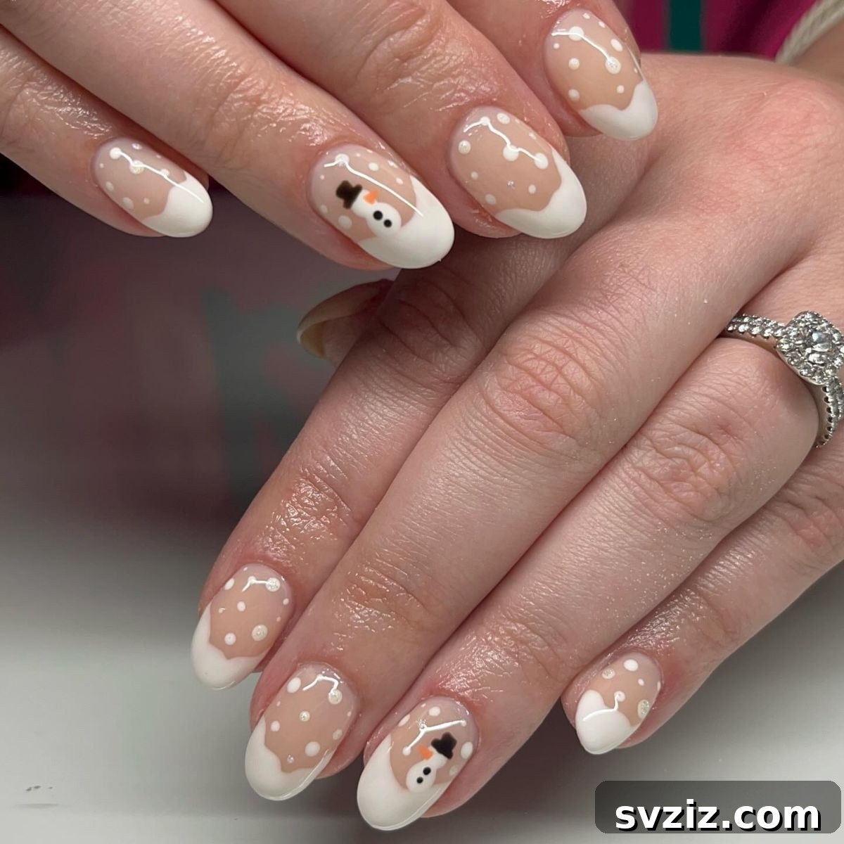 9. Snowy French Tips and Cute Snowmen