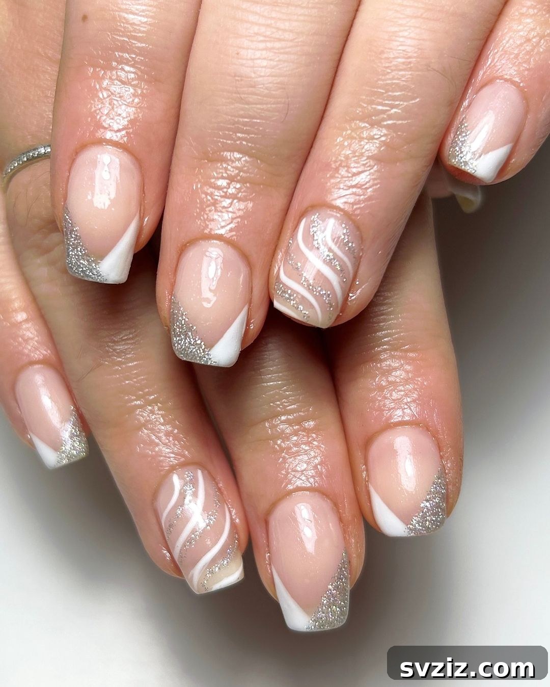 10. White and Silver Manicure