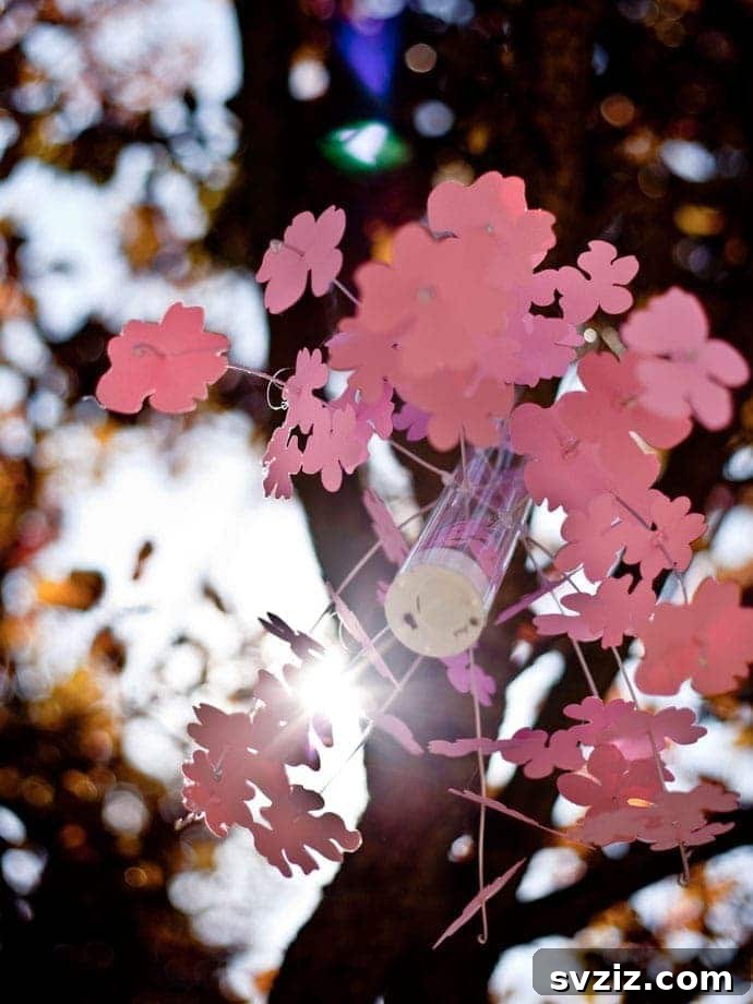 53 Paper Craft Ideas to Spark Your Imagination 18 Delicate cherry blossoms lantern made from paper