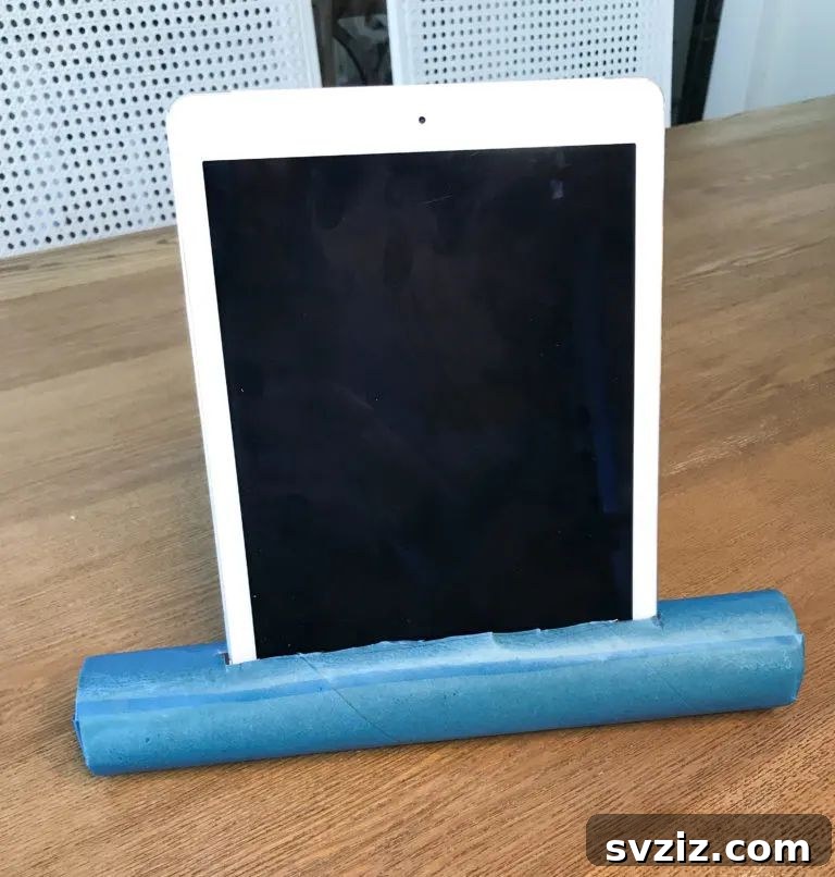 53 Paper Craft Ideas to Spark Your Imagination 24 DIY tablet stand made from a repurposed paper towel roll