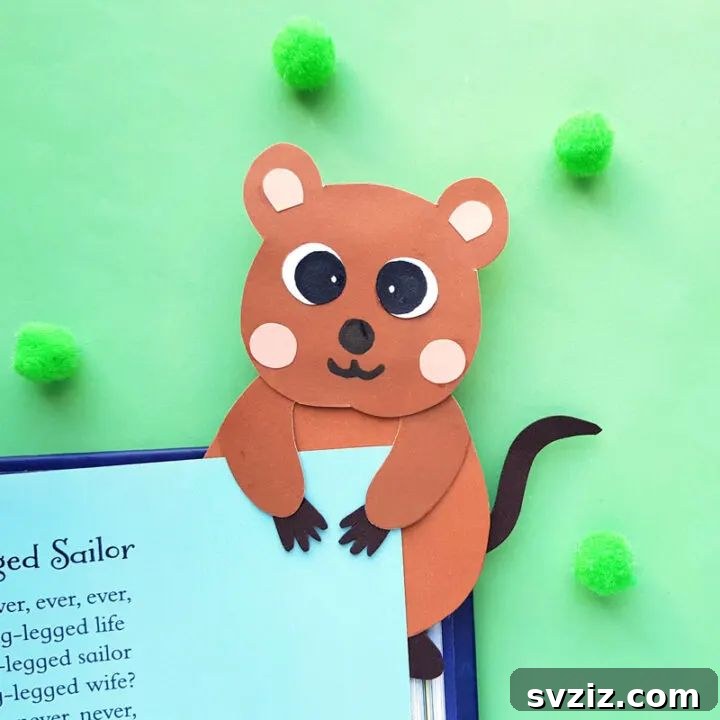 53 Paper Craft Ideas to Spark Your Imagination 38 Cute quokka bookmark made from paper, holding a page