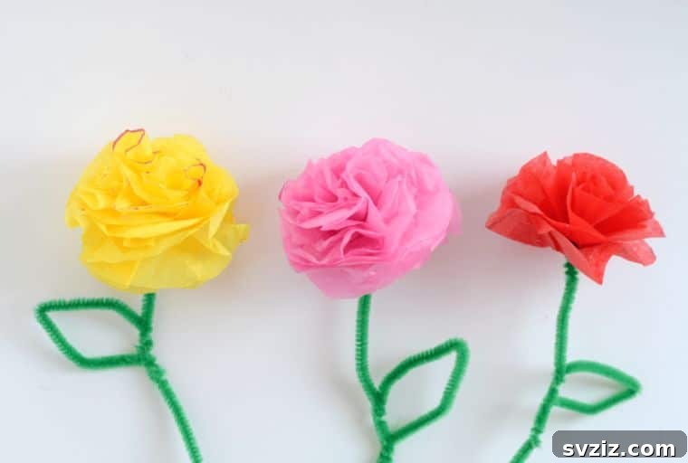 53 Paper Craft Ideas to Spark Your Imagination 7 Colorful tissue paper flowers bringing spring vibes indoors