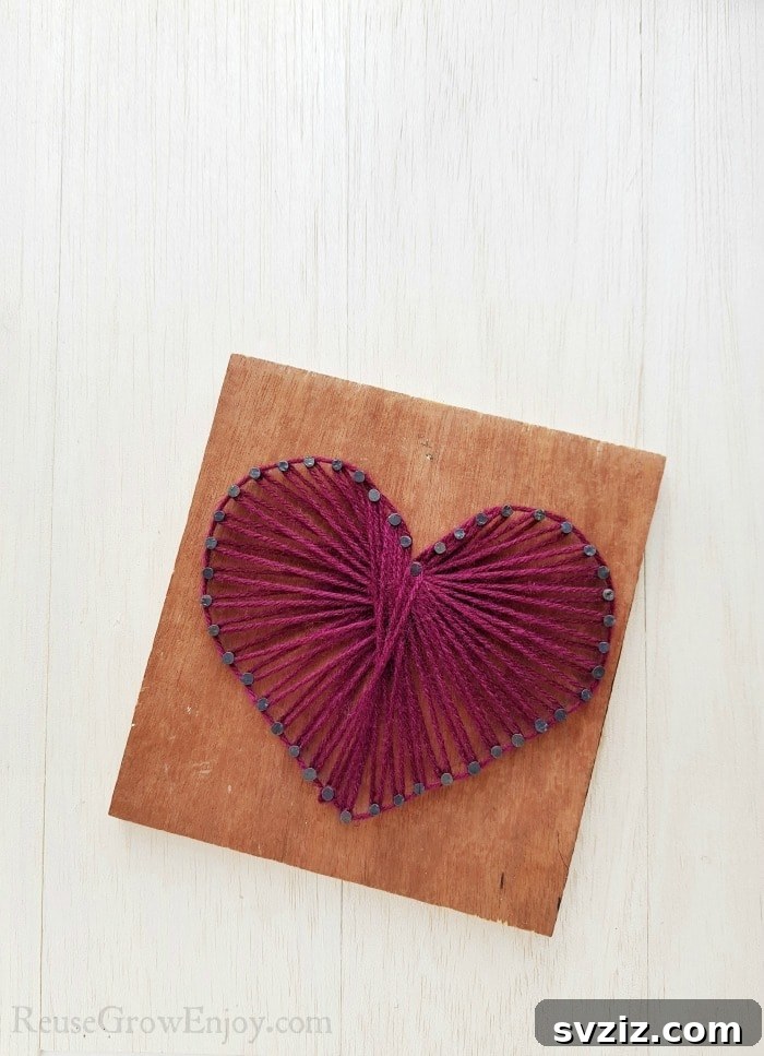 DIY Heart String Art on wood, expressing love